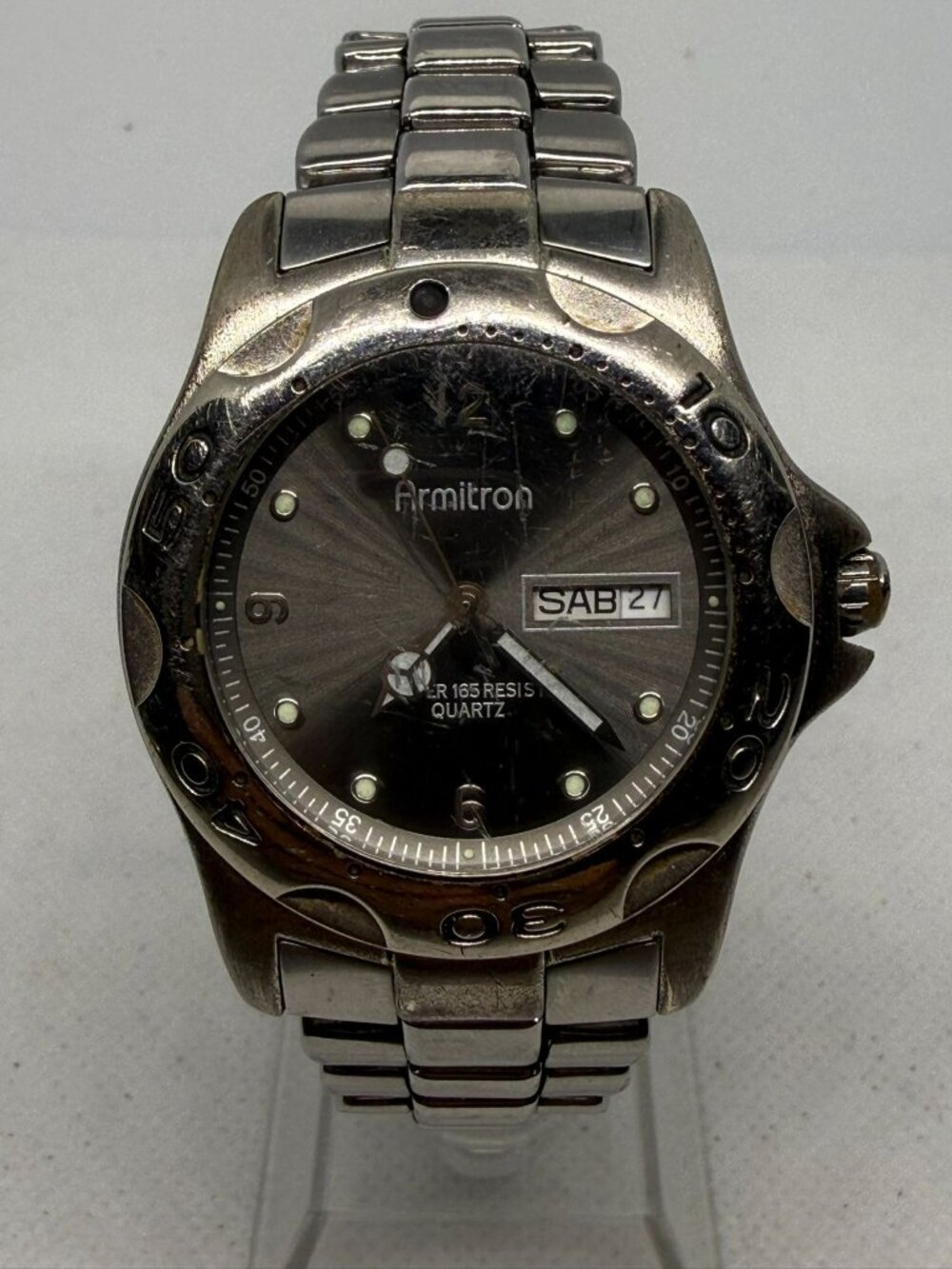Armitron Men's SS Rotating Bezel Dark Grey Dial Day Date Bracelet Quartz Watch